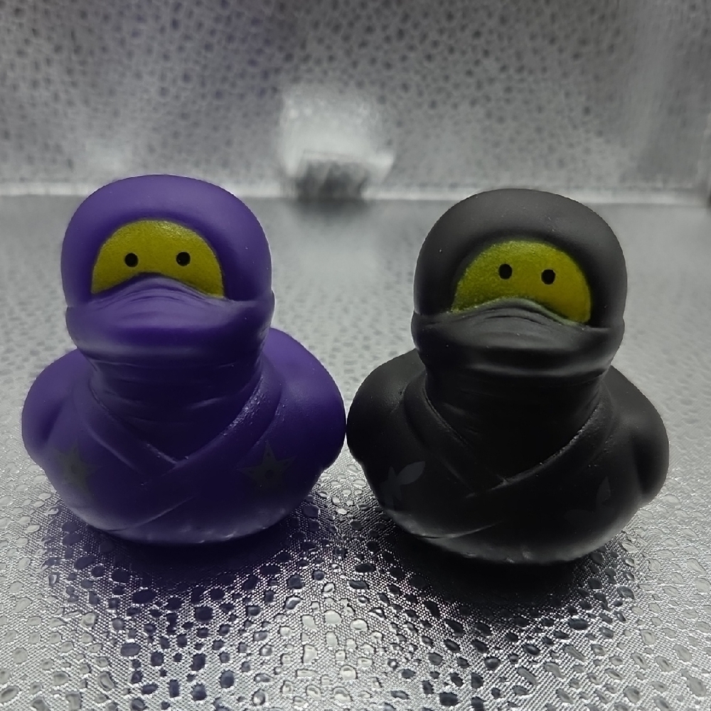 Ducks Purple and Black Ninja Rubber  NWOT #1